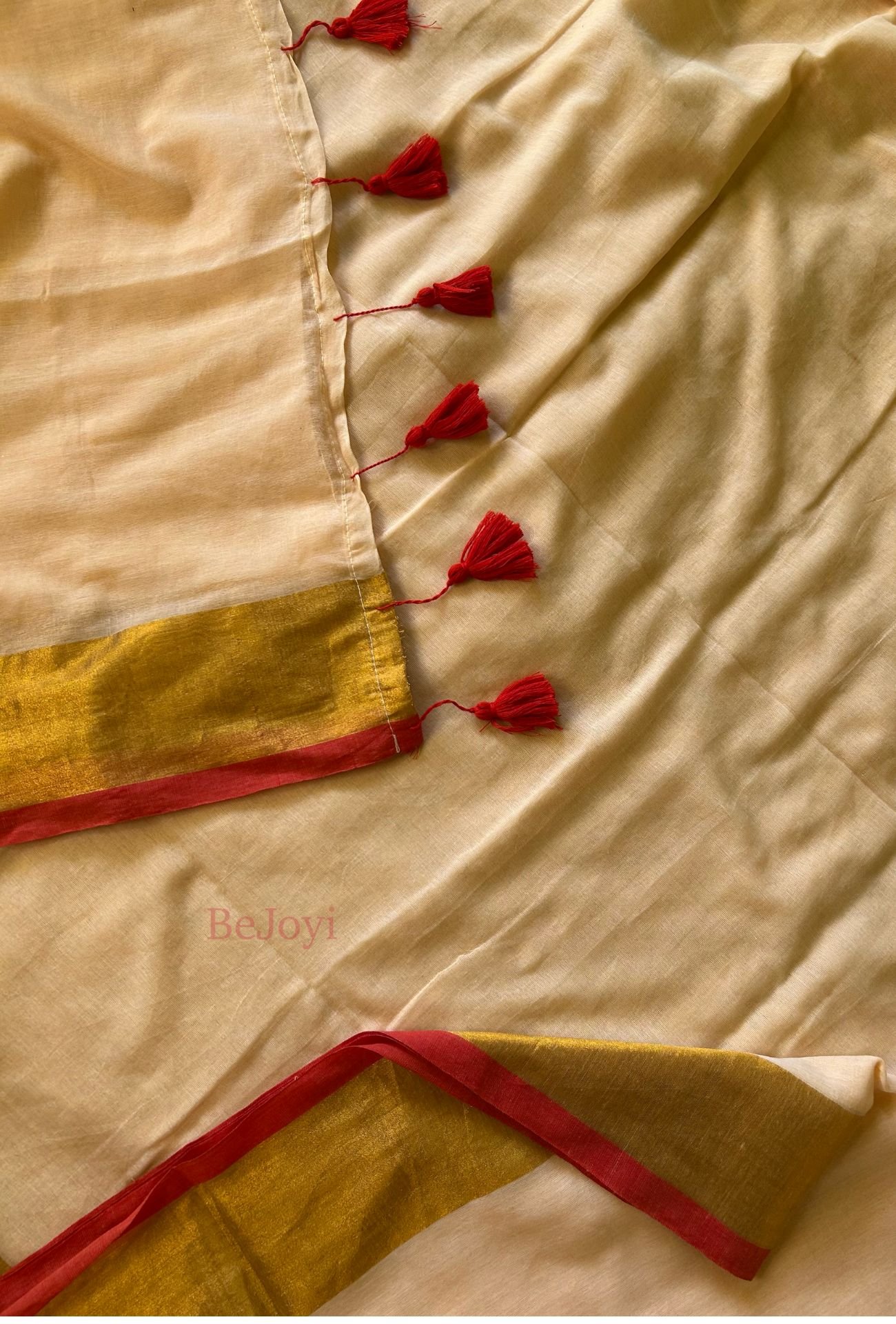 Devika – Beige Gold Zari Red Border Mulmul Cotton Saree