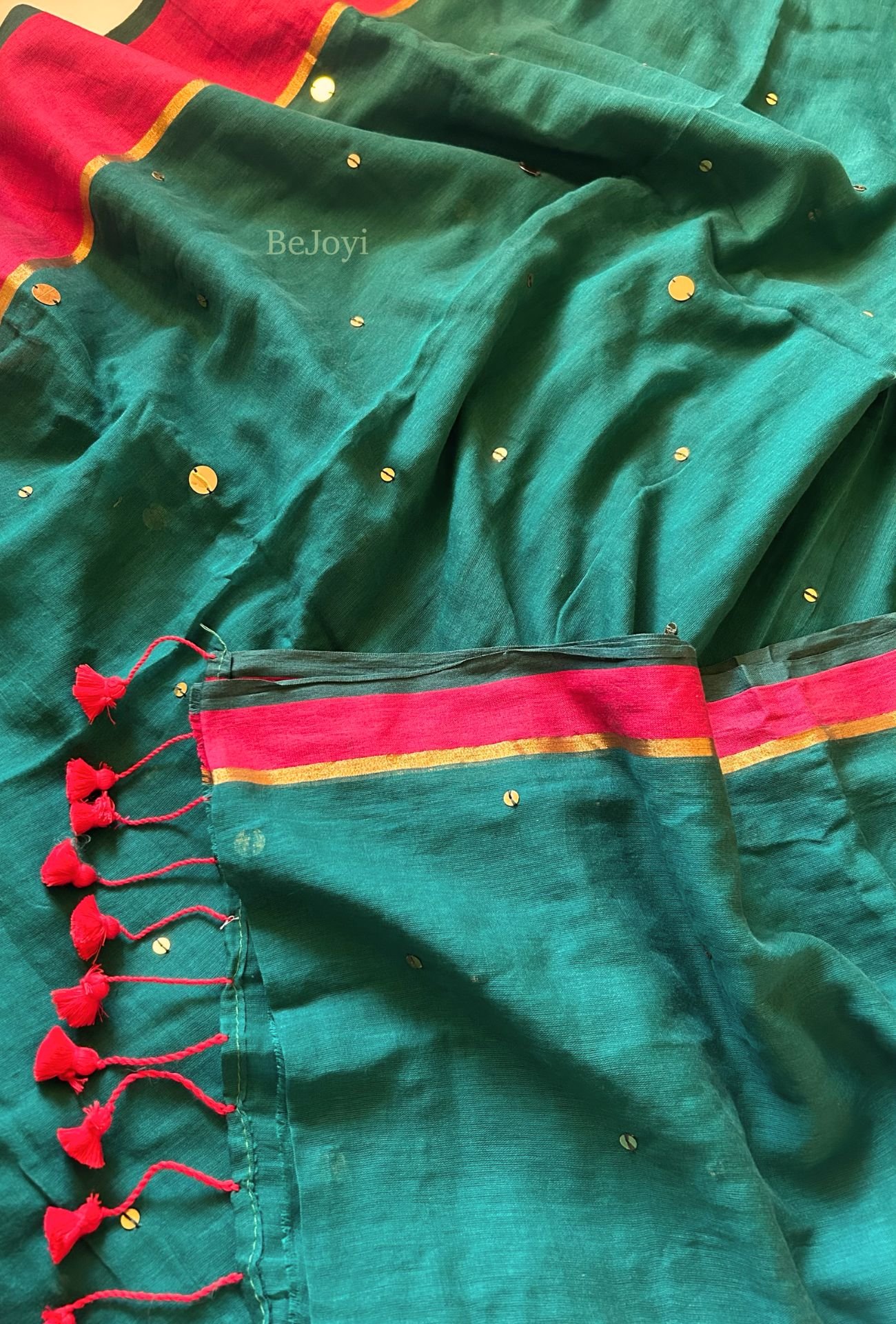 Ragini – Emerald Green & Rani Pink Sequin Mulmul Cotton Saree