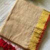 Devika – Sandalwood Beige Gold Zari Red Border Mulmul Saree
