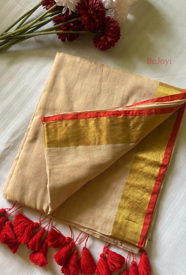 Devika – Sandalwood Beige Gold Zari Red Border Mulmul Saree