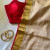 Devika – Sandalwood Beige Gold Zari Red Border Mulmul Saree